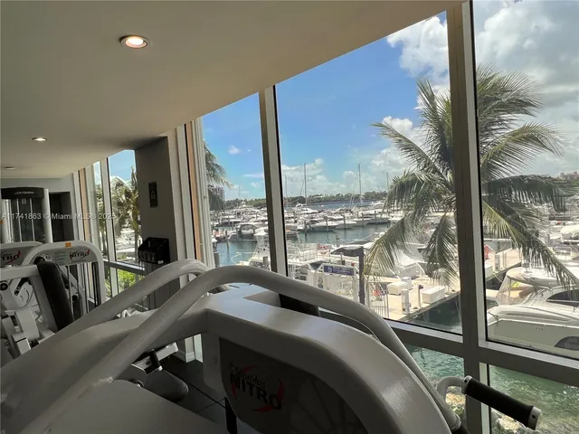 a view of a balcony with furniture