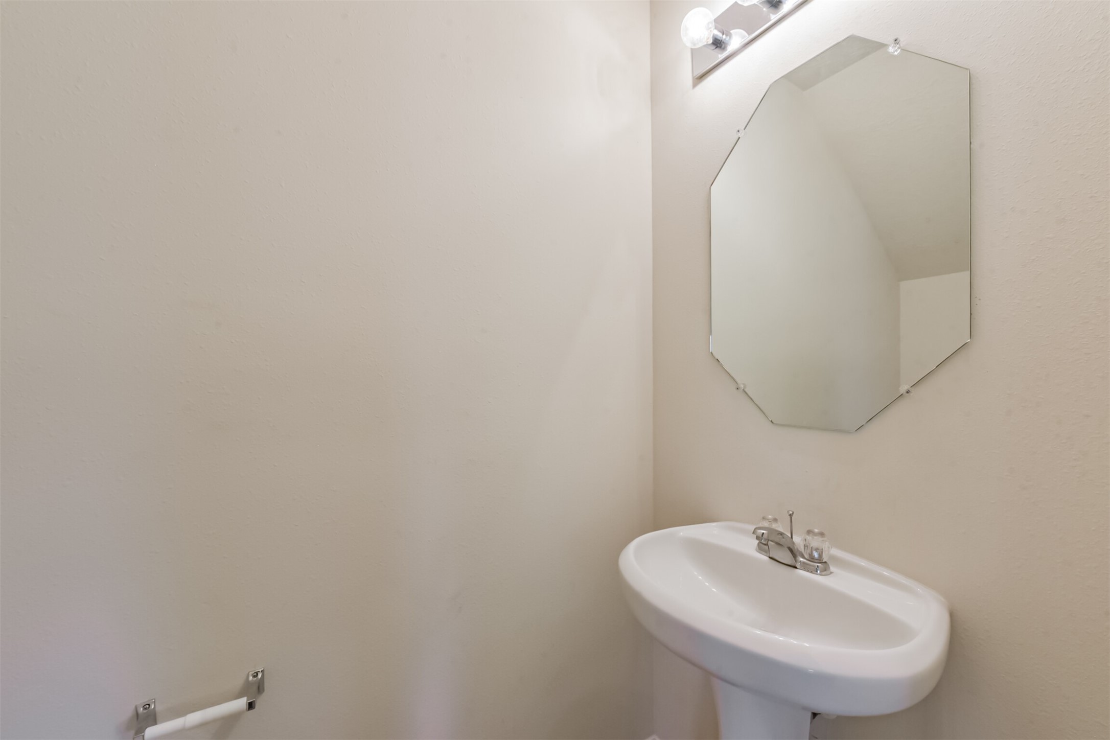 2142 Tandy Park Way Houston, TX 77047 - Photo 15 of 35 a bathroom with a sink and mirror