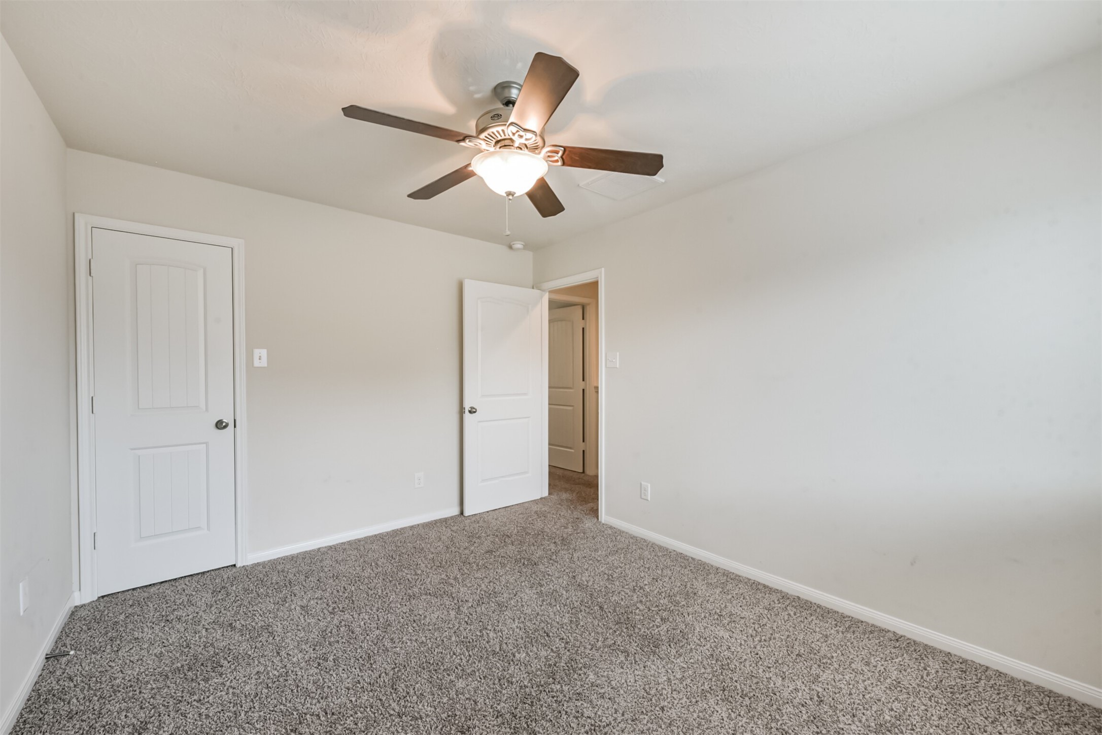 2142 Tandy Park Way Houston, TX 77047 - Photo 24 of 35 a view of an empty room and wooden floor