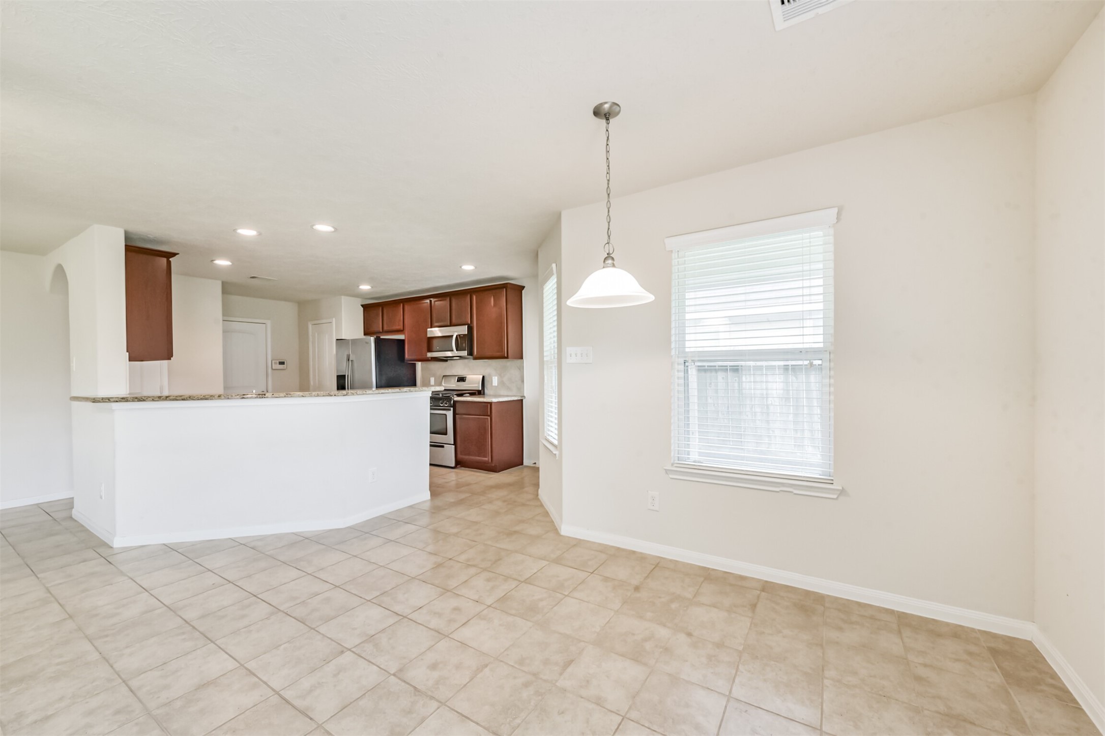 2142 Tandy Park Way Houston, TX 77047 - Photo 8 of 35 a view of kitchen with furniture and refrigerator