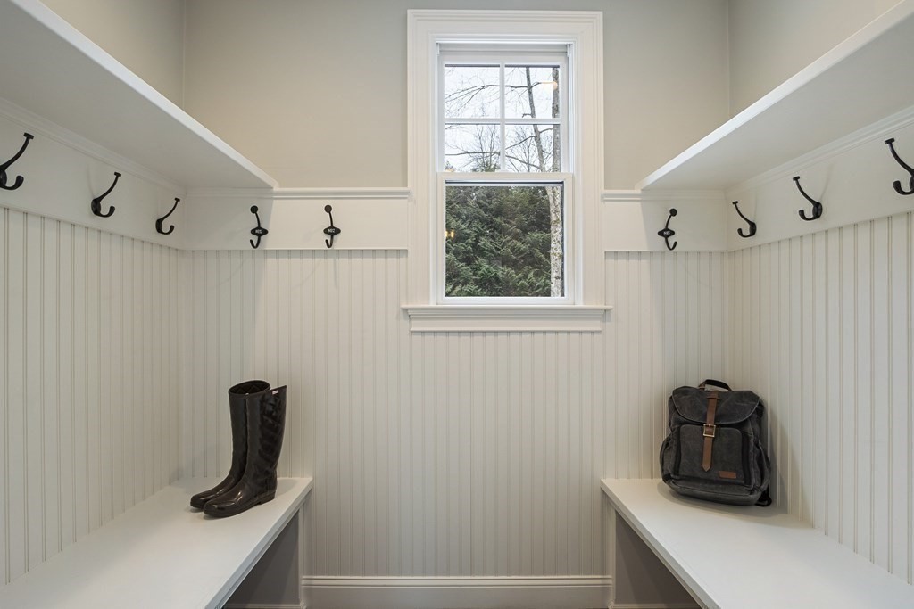 61 Garfield Road Concord, MA 01742 - Photo 16 of 33 a bathroom with a window a light fixture and a window