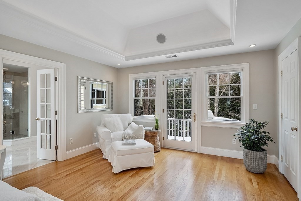 61 Garfield Road Concord, MA 01742 - Photo 19 of 33 a living room with furniture and wooden floor