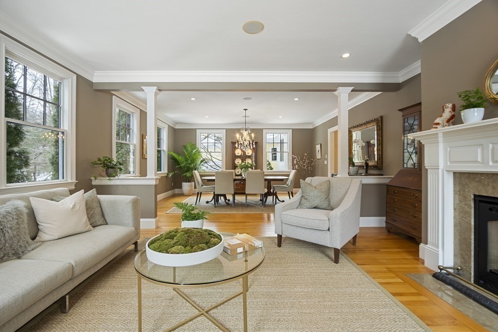 61 Garfield Road Concord, MA 01742 - Photo 2 of 33 a living room with furniture a fireplace and a window