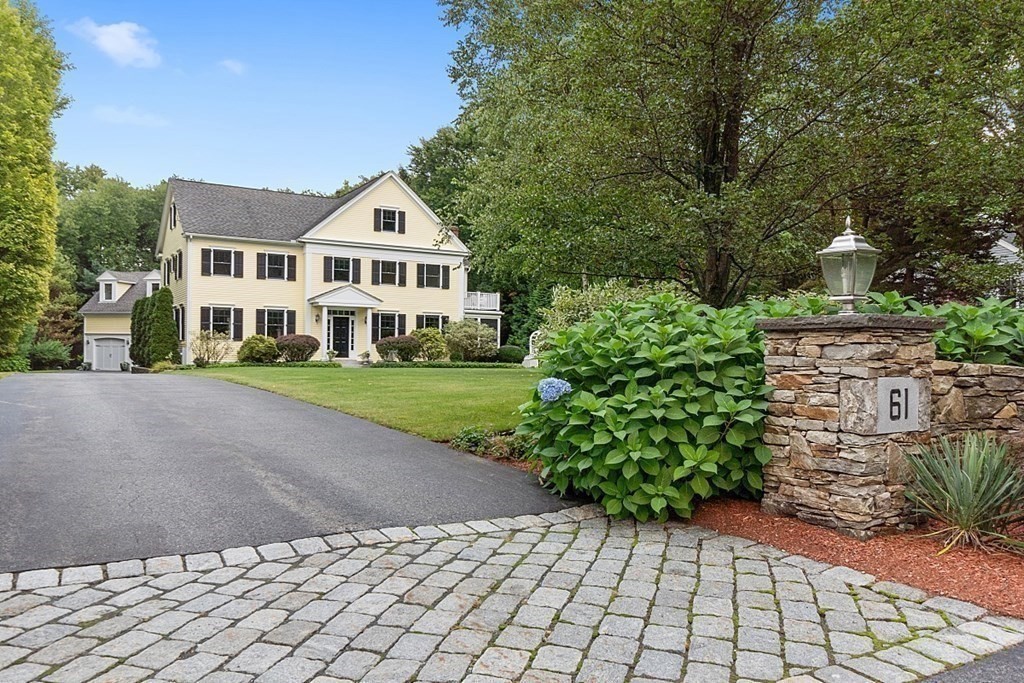 61 Garfield Road Concord, MA 01742 - Photo 33 of 33 a house with a yard
