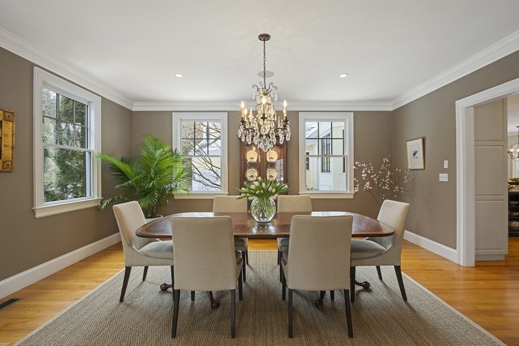 61 Garfield Road Concord, MA 01742 - Photo 5 of 33 a view of a dining room with furniture window and wooden floor