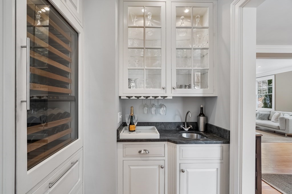 61 Garfield Road Concord, MA 01742 - Photo 8 of 33 a kitchen with a sink and cabinets