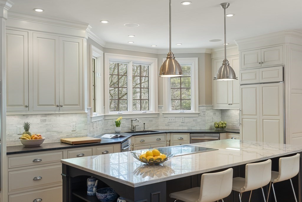 61 Garfield Road Concord, MA 01742 - Photo 10 of 33 a kitchen with a sink cabinets and window