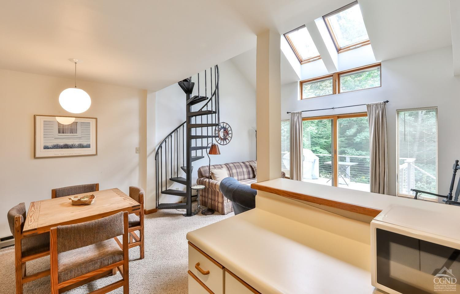 91 Windham Ridge Road, Unit 18B Windham, NY 12496 - Photo 12 of 30 a living room with furniture and a window