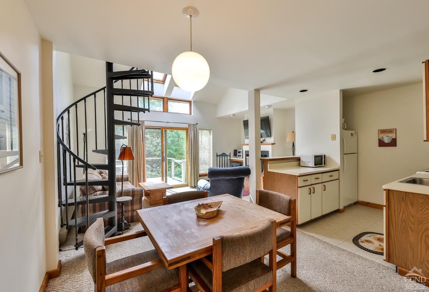 91 Windham Ridge Road, Unit 18B Windham, NY 12496 - Photo 16 of 30 a very nice looking dining room with a large window and dining table