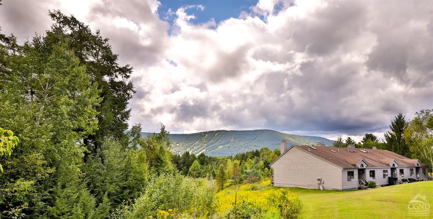 91 Windham Ridge Road, Unit 18B Windham, NY 12496 - Photo 27 of 30 a view of houses with sky view