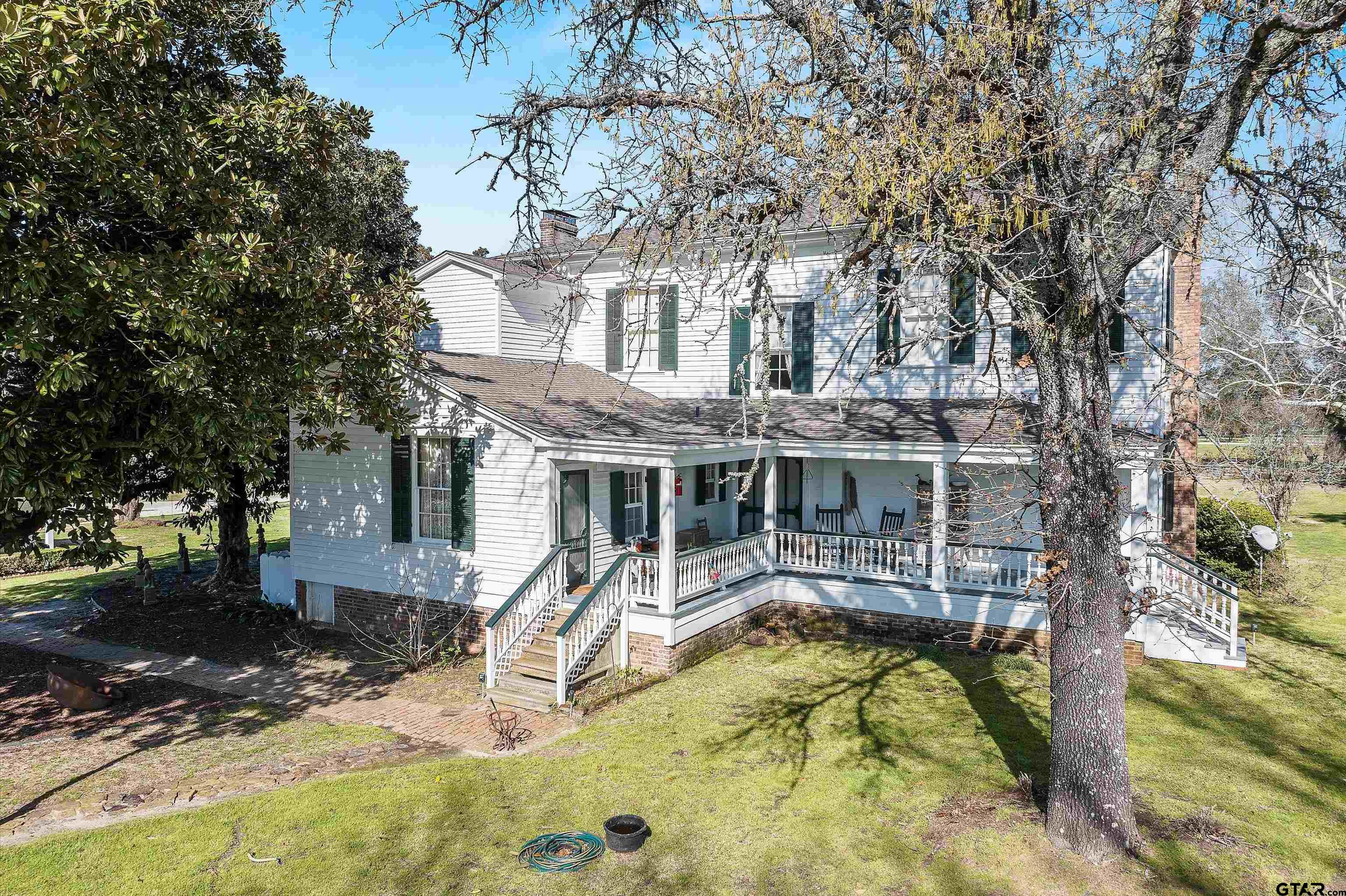 11992 County Road 4233 Cushing, TX 75760 - Photo 14 of 48 front view of house with a swimming pool
