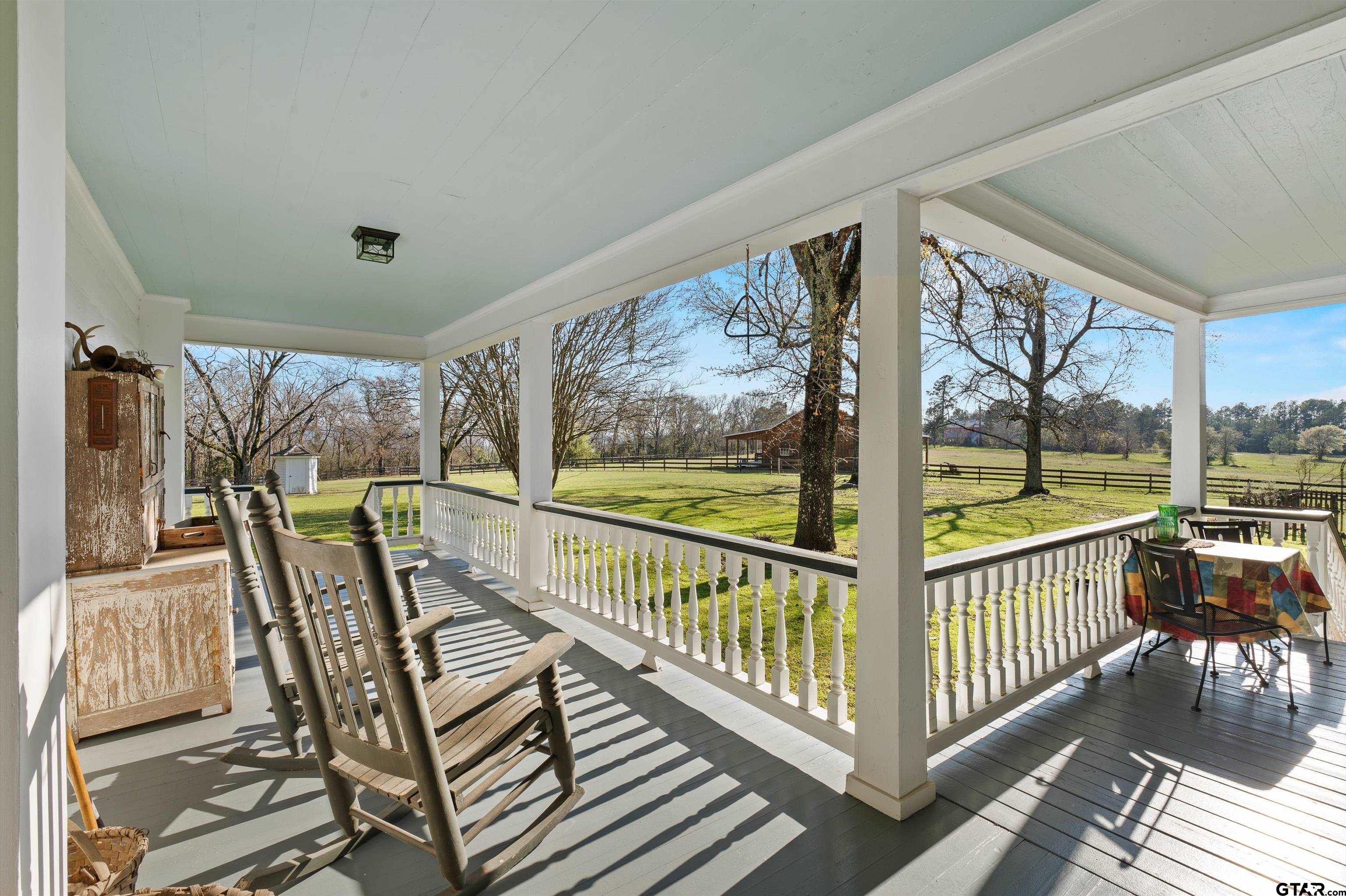 11992 County Road 4233 Cushing, TX 75760 - Photo 16 of 48 a view of a city from a balcony with furniture