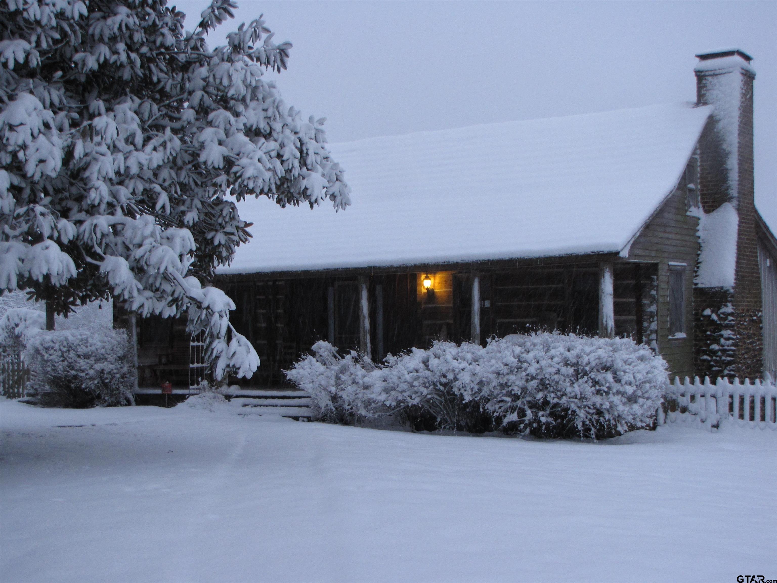 11992 County Road 4233 Cushing, TX 75760 - Photo 18 of 48 a view of a house with a yard and garage