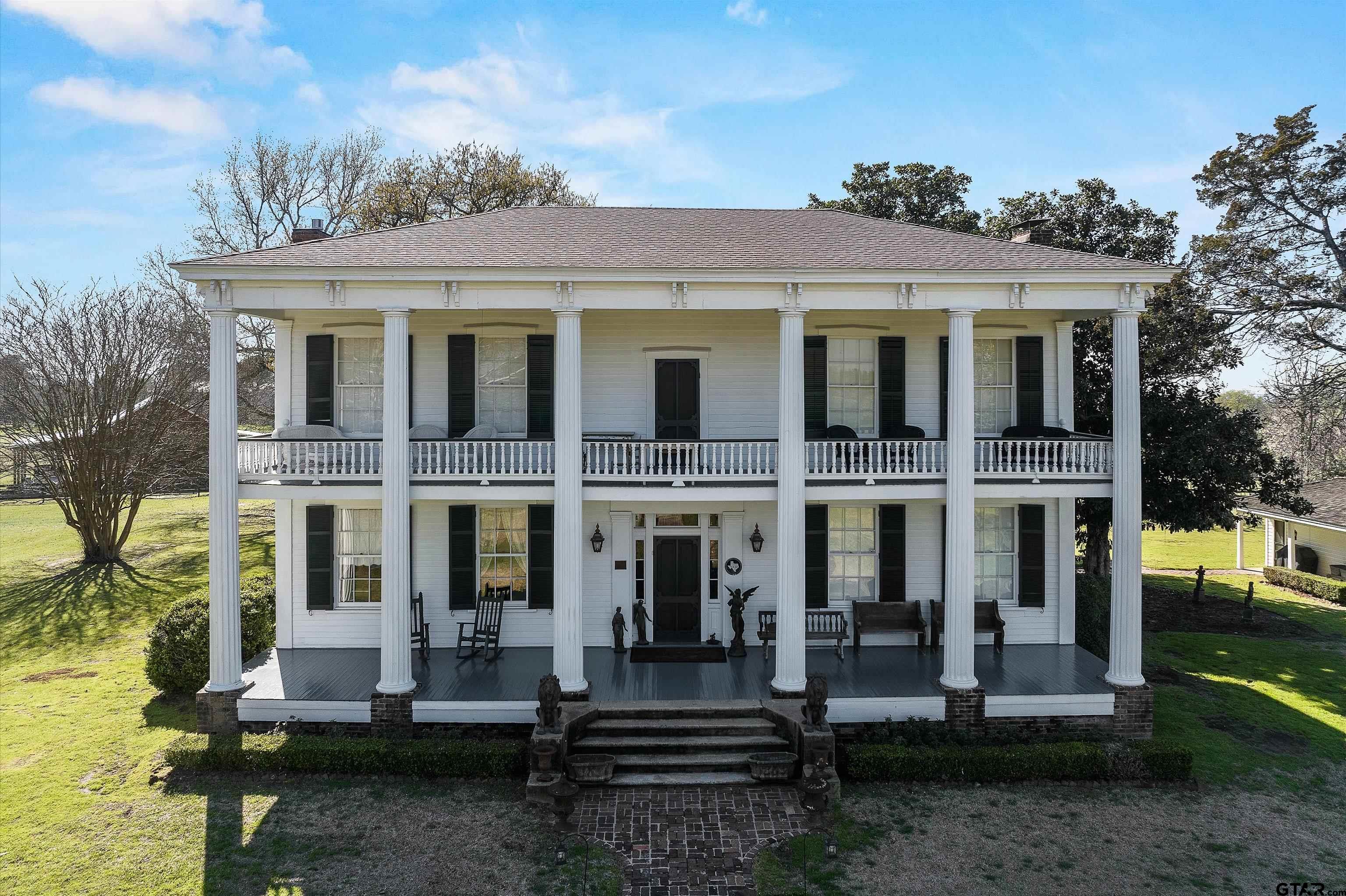 11992 County Road 4233 Cushing, TX 75760 - Photo 2 of 48 a front view of a house with a yard