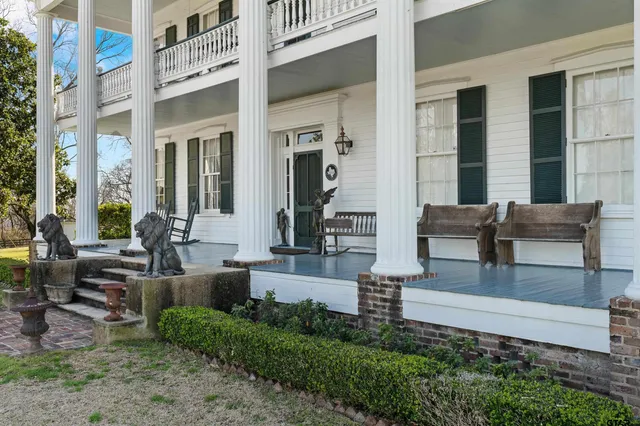 a view of brick building with many windows