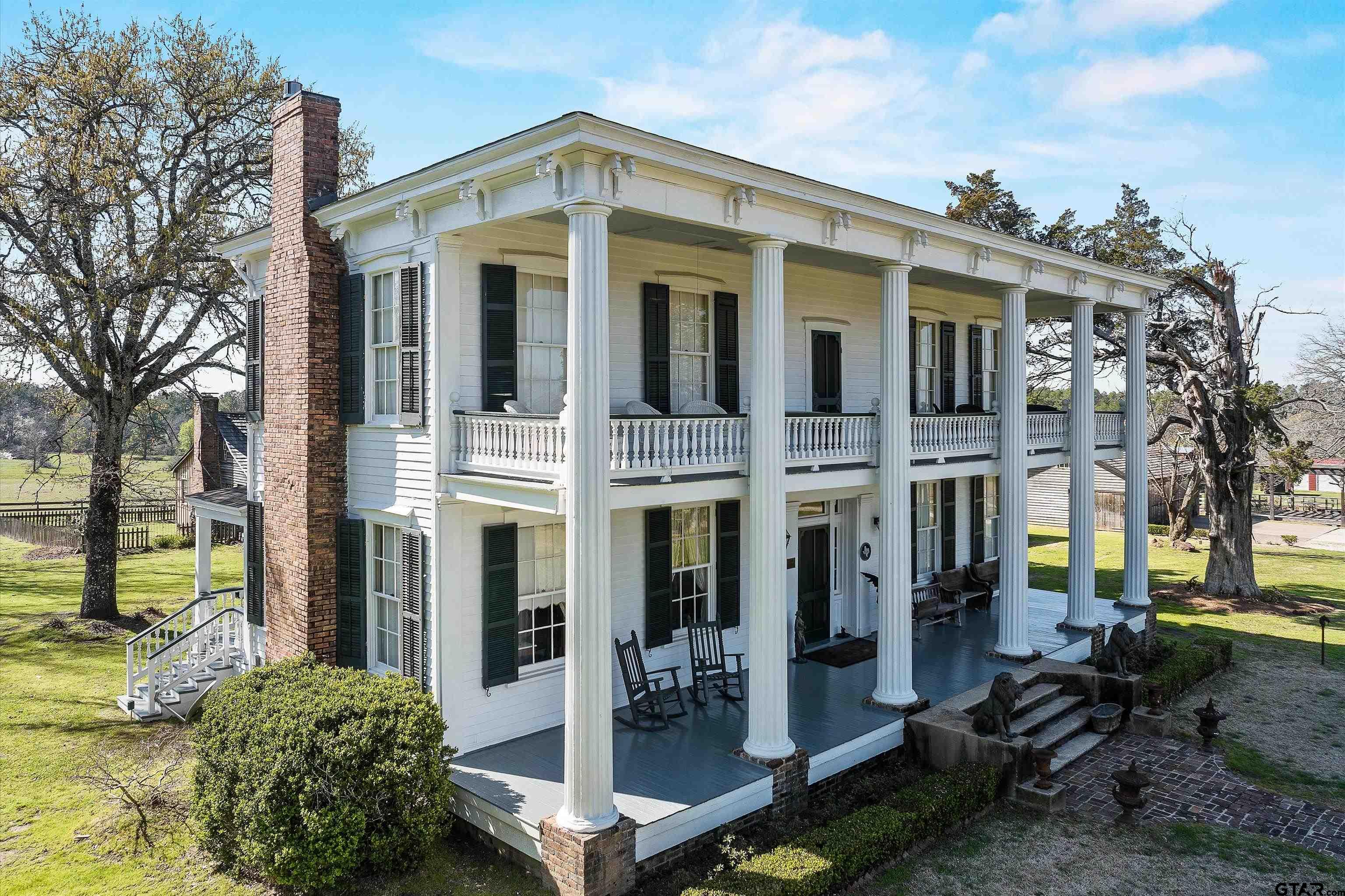 11992 County Road 4233 Cushing, TX 75760 - Photo 36 of 48 a front view of a building with sitting area