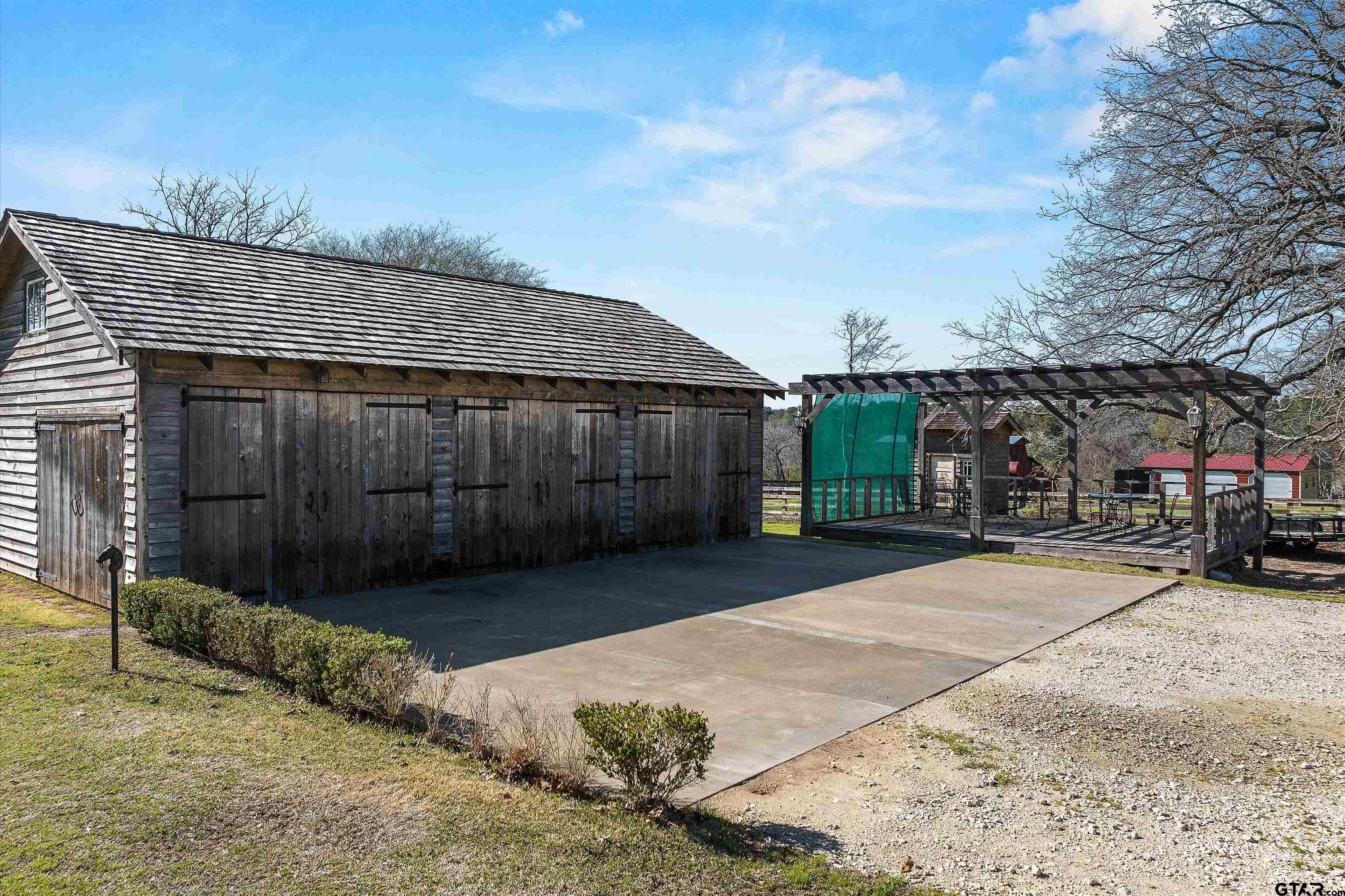 11992 County Road 4233 Cushing, TX 75760 - Photo 41 of 48 a view of a house with a yard