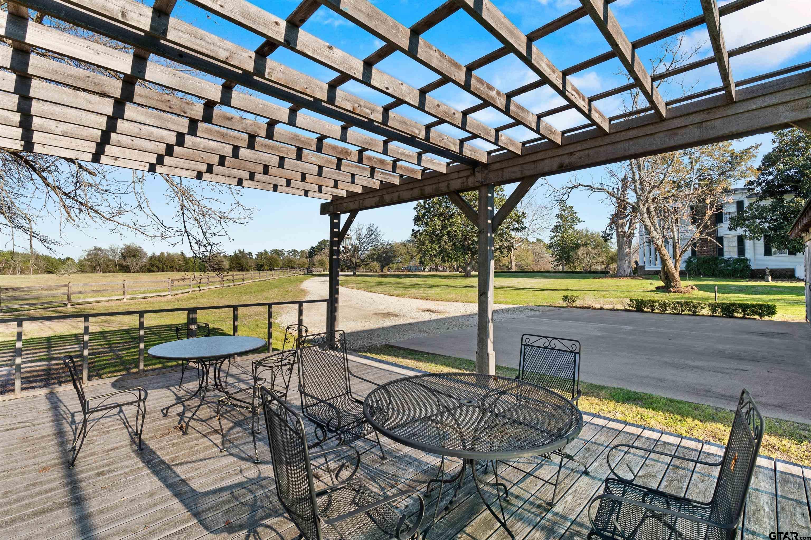 11992 County Road 4233 Cushing, TX 75760 - Photo 44 of 48 a view of a swimming pool with an outdoor seating