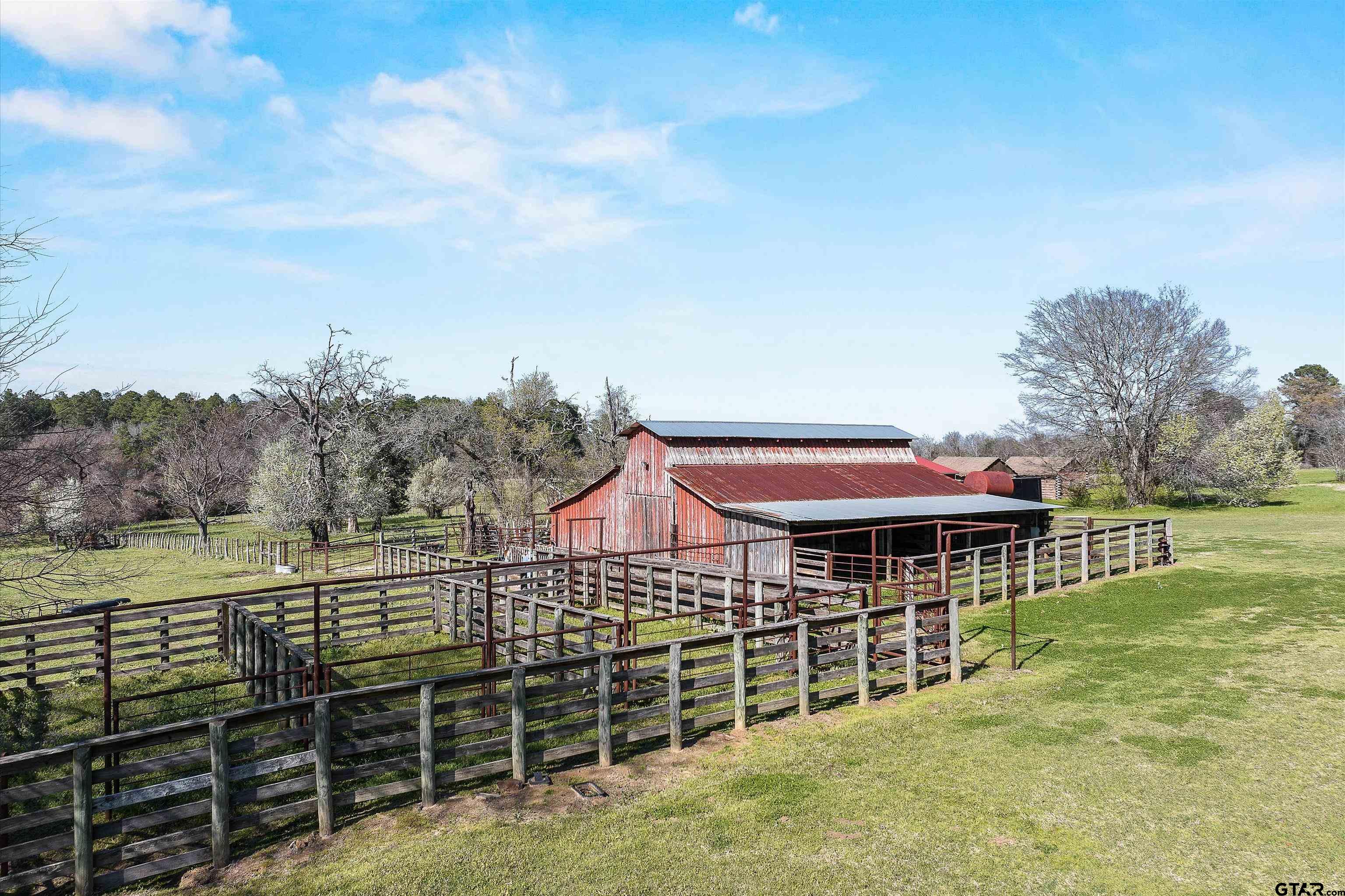 11992 County Road 4233 Cushing, TX 75760 - Photo 45 of 48 a view of a house with a yard