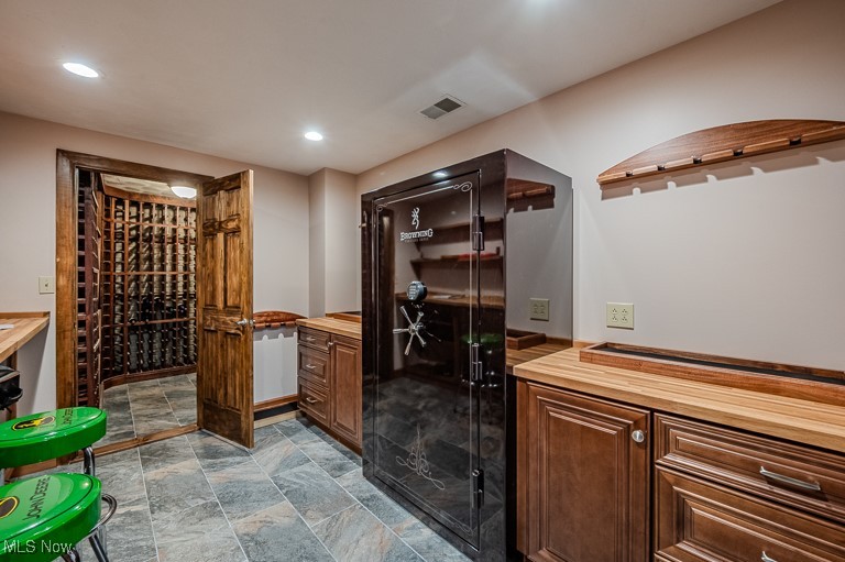 434 Rector Road Parkersburg, WV 26104 - Photo 48 of 50 Wine cellar featuring stone finish floor, recessed lighting, and visible vents