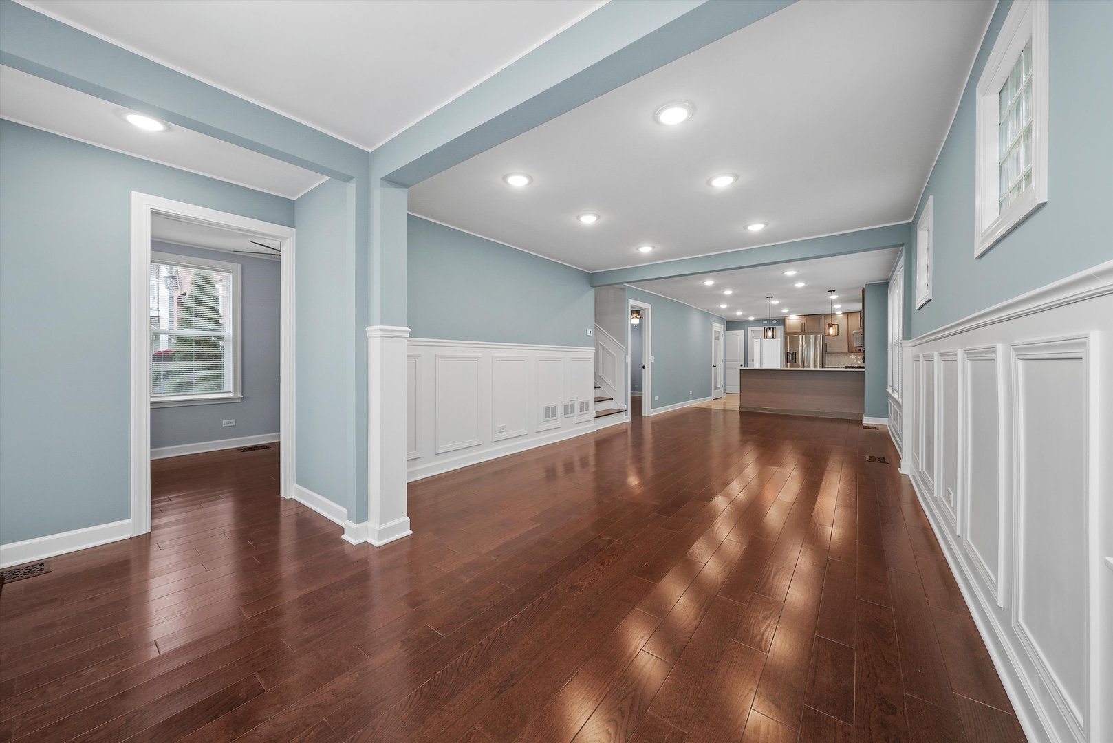 Undisclosed Address Chicago, IL 60656 - Photo 16 of 38 a view of a hallway with wooden floor