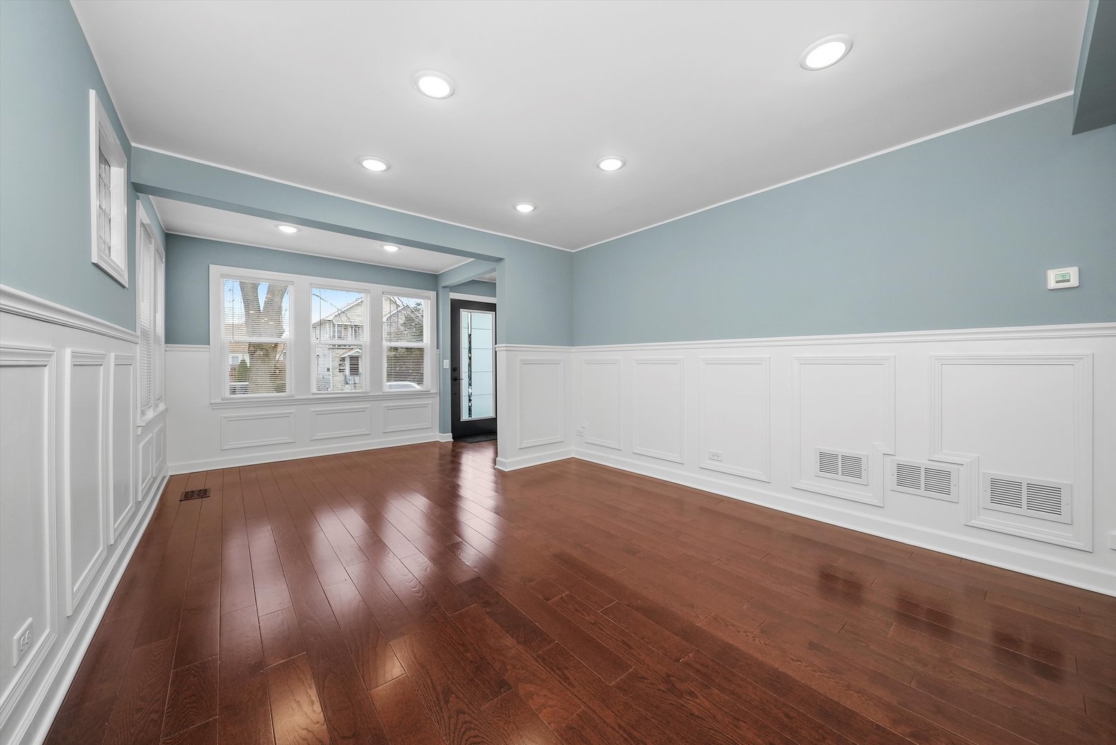 Undisclosed Address Chicago, IL 60656 - Photo 17 of 38 a view of an empty room with wooden floor and a window