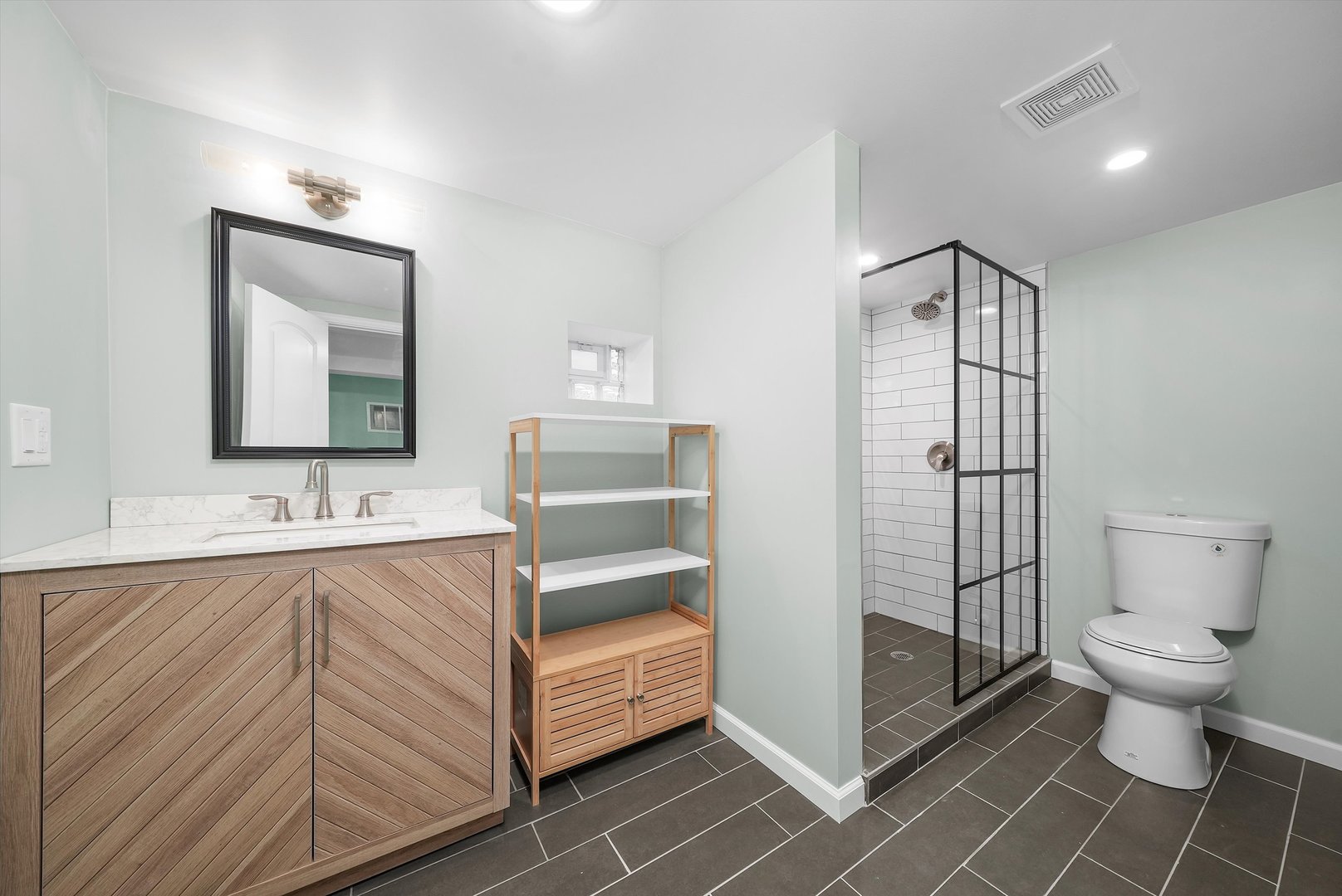 Undisclosed Address Chicago, IL 60656 - Photo 29 of 38 a bathroom with a sink toilet and shower