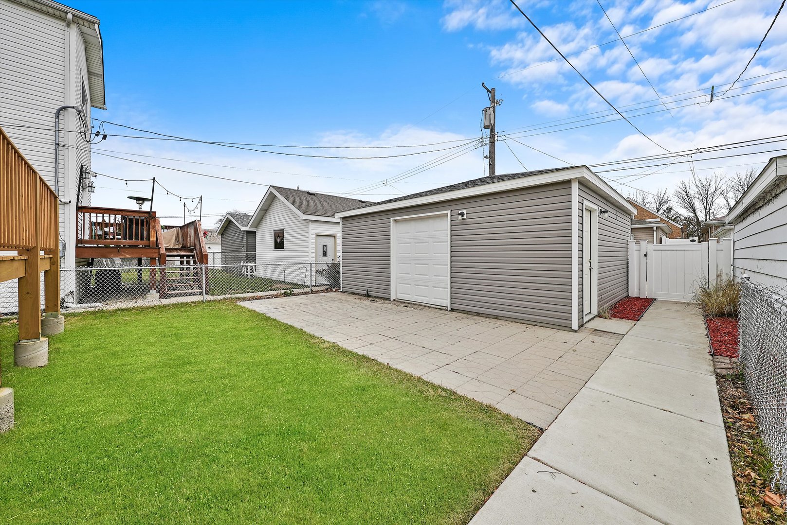 Undisclosed Address Chicago, IL 60656 - Photo 4 of 38 a view of a house with a backyard