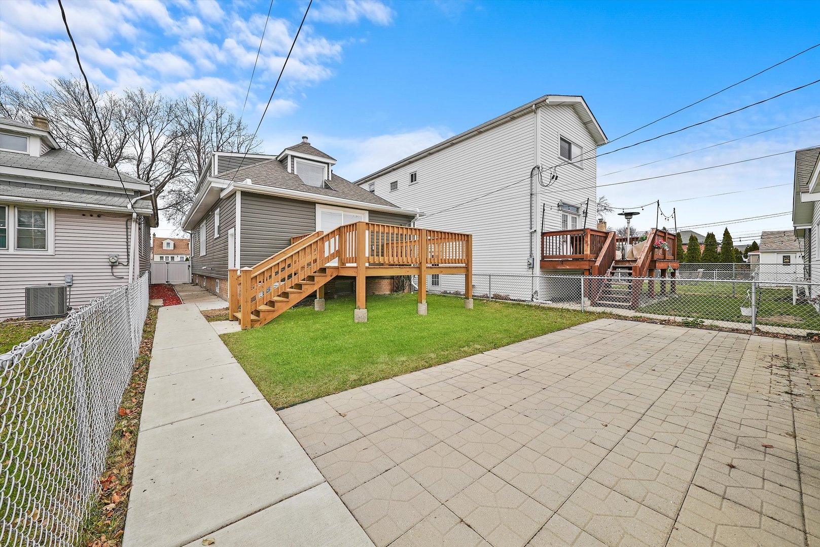 Undisclosed Address Chicago, IL 60656 - Photo 5 of 38 a view of a porch with a yard