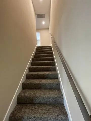 a view of a pathway with a building