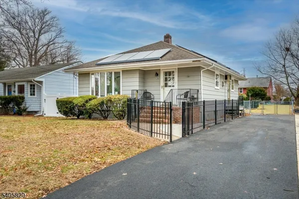 a front view of a house with a porch