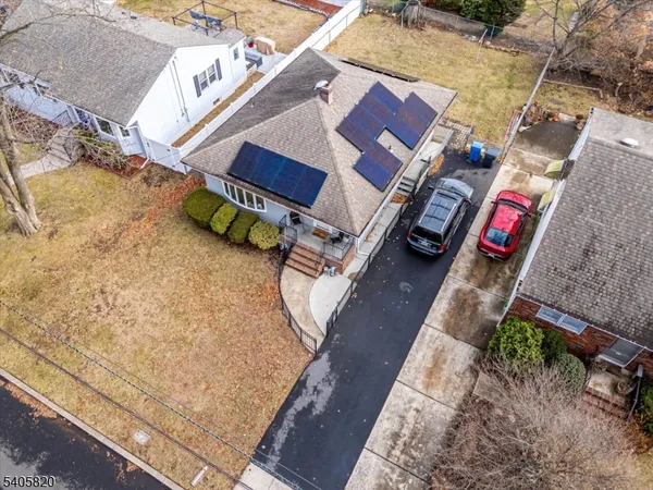 a view of a chairs in a backyard