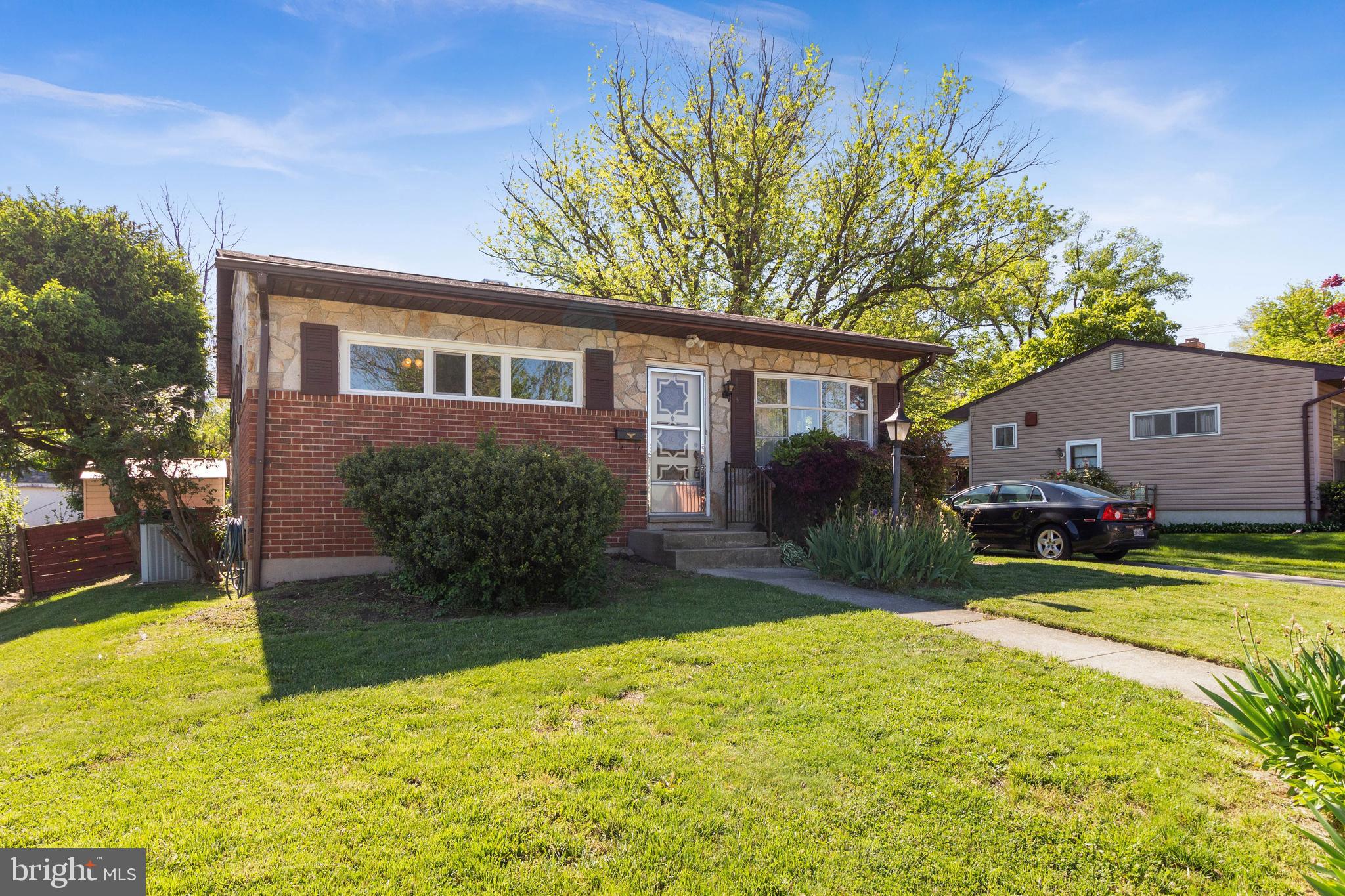 6307 Tramore Road Baltimore, MD 21214 - Photo 2 of 19 a view of a house with a yard