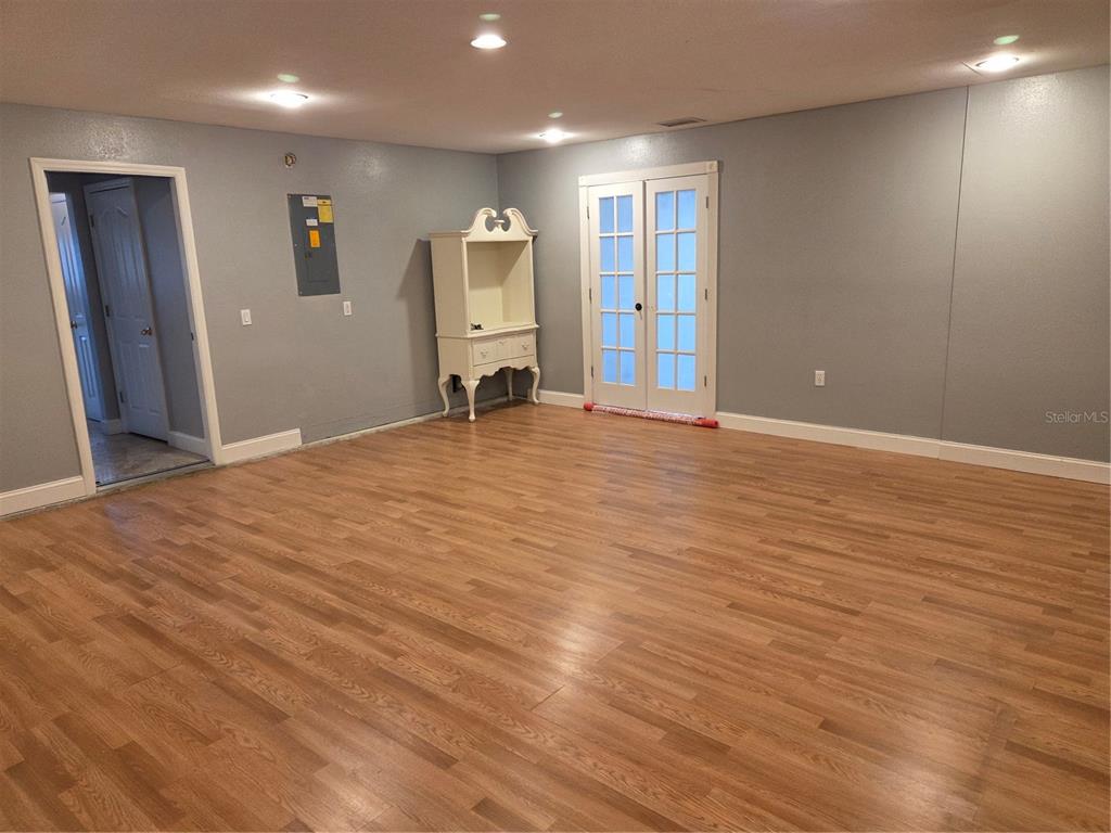 2728 Amanda Kay Way Kissimmee, FL 34744 - Photo 7 of 16 a view of a livingroom with wooden floor