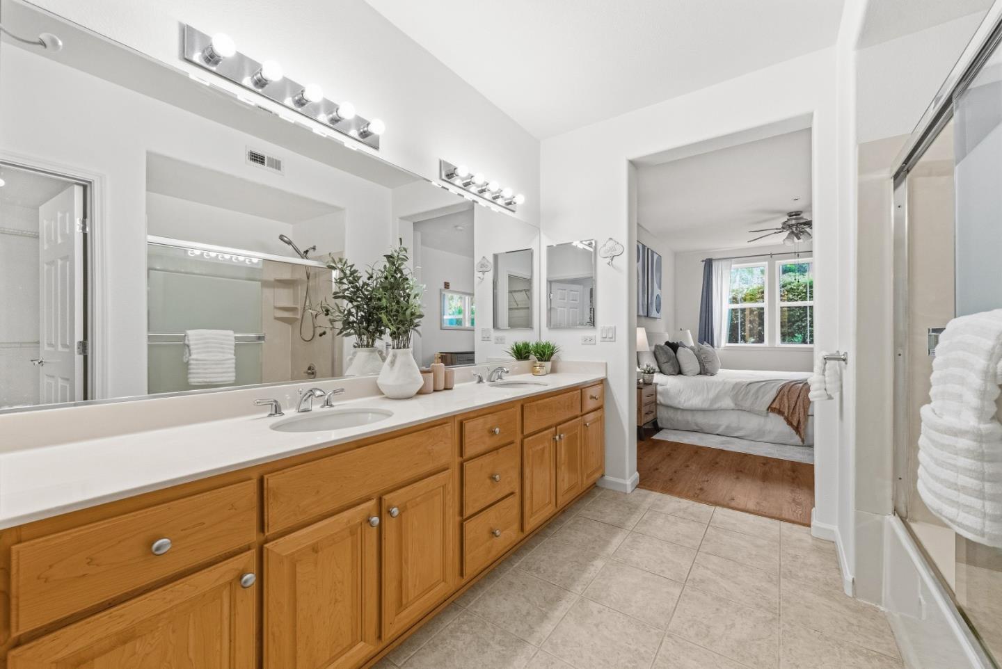 1390 Saddle Rack Street, Unit 223 San Jose, CA 95126 - Photo 14 of 36 a spacious en suite bathroom with double sink and a large mirror