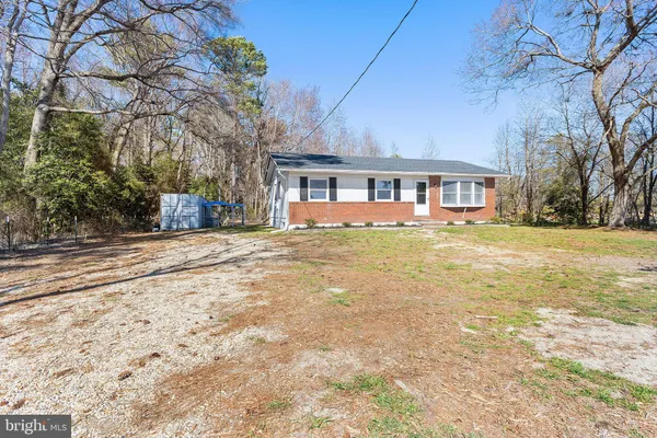 a house view with a outdoor space