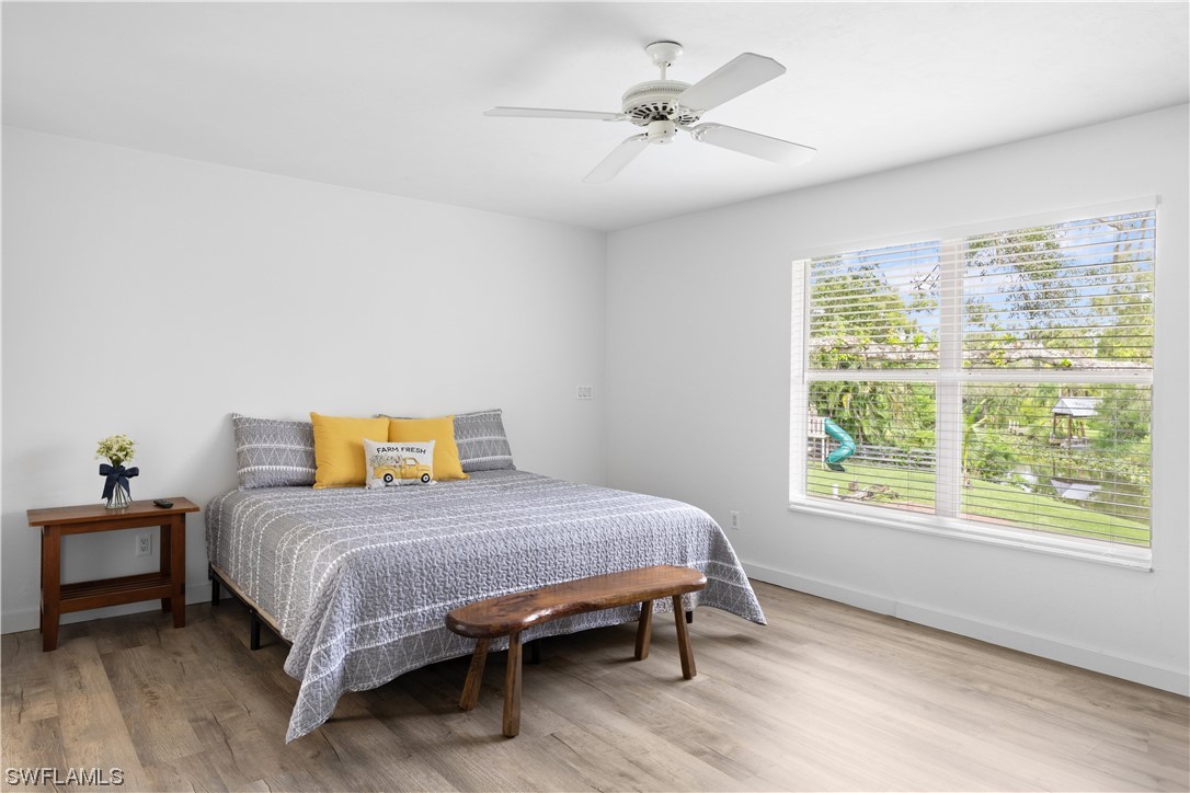 17301 Frank Road Alva, FL 33920 - Photo 17 of 46 a bedroom with a bed and a window