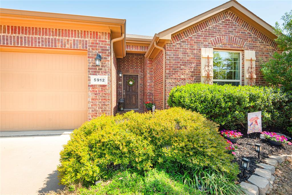 5912 Comanche Peak Drive Fort Worth, TX 76179 - Photo 1 of 1 a front view of a house with a yard
