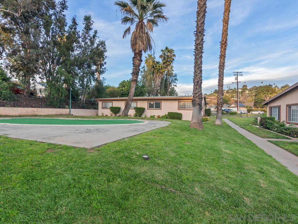 1019 Chestnut Street Escondido, CA 92025 - Photo 5 of 35 a swimming pool with outdoor seating and yard
