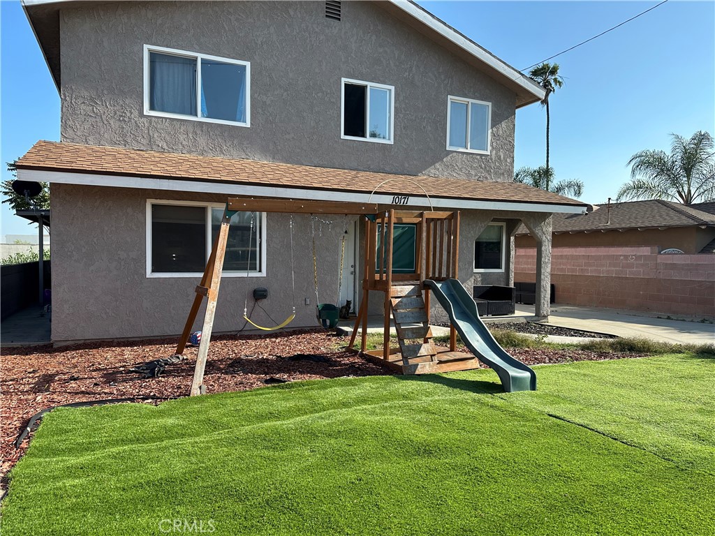 10171 8th Street Rancho Cucamonga, CA 91730 - Photo 1 of 1 a view of a house with a backyard