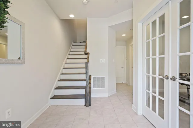 a view of an entryway with staircase