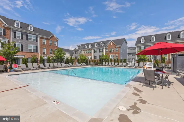 a view of a swimming pool with a patio