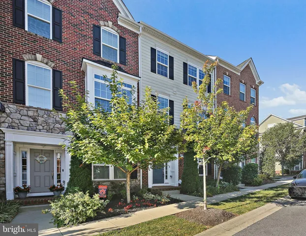 a front view of a multi story residential apartment building