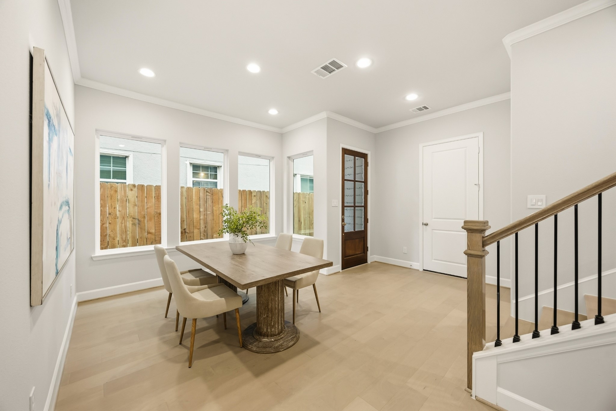 4317 Roseland Street, Unit B Houston, TX 77006 - Photo 12 of 29 From another angle, the dining room reveals its generous proportions, ready to host your gatherings with grace and doors that open to welcome you home.
