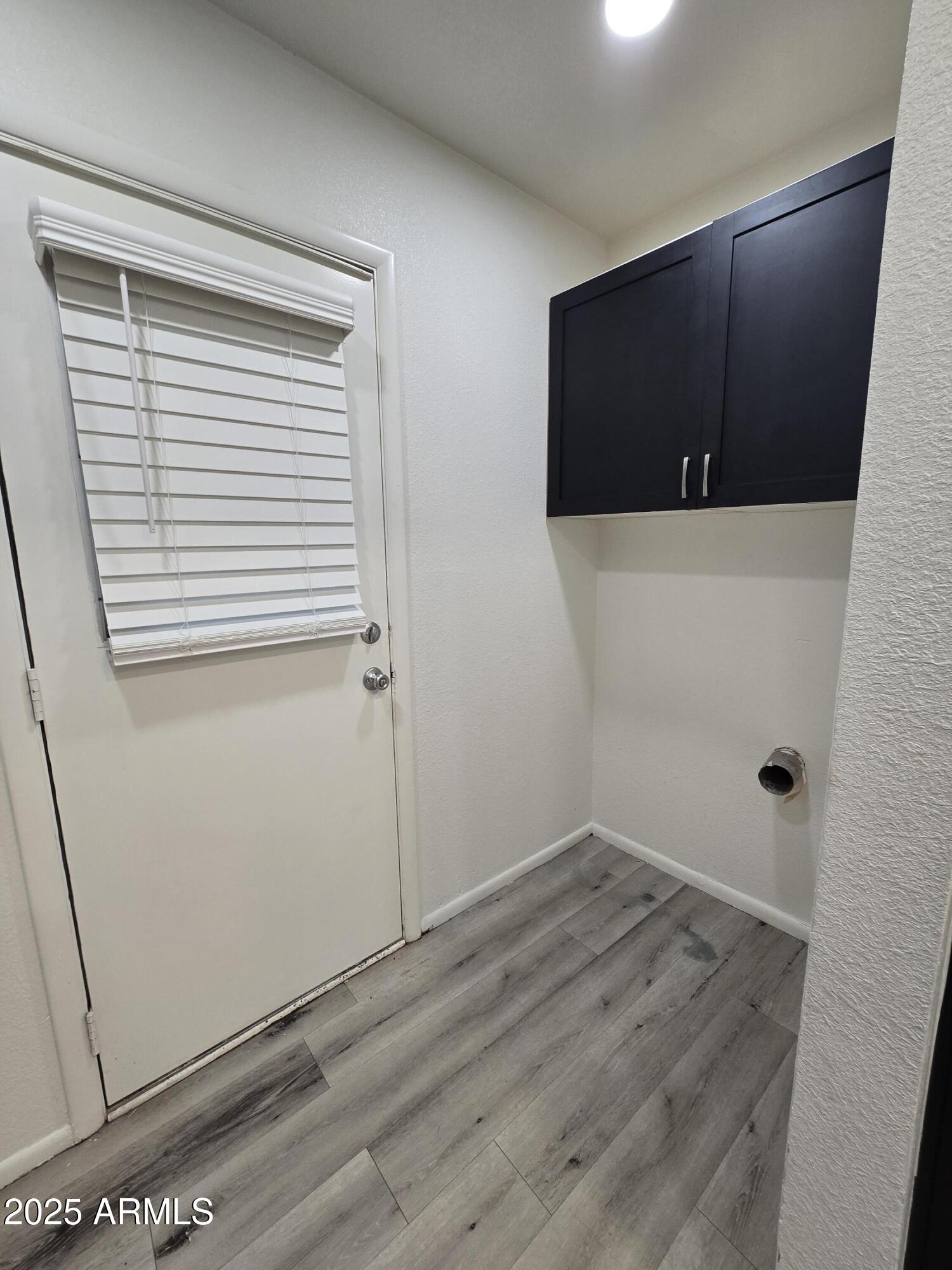 2211 West Pecan Road Phoenix, AZ 85041 - Photo 11 of 21 a view of wooden floor