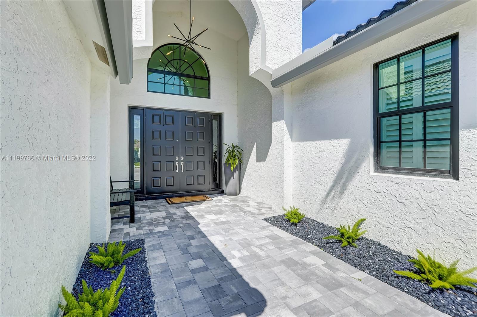 9901 North Abiaca Circle Davie, FL 33328 - Photo 3 of 46 a view of entrance gate of the house