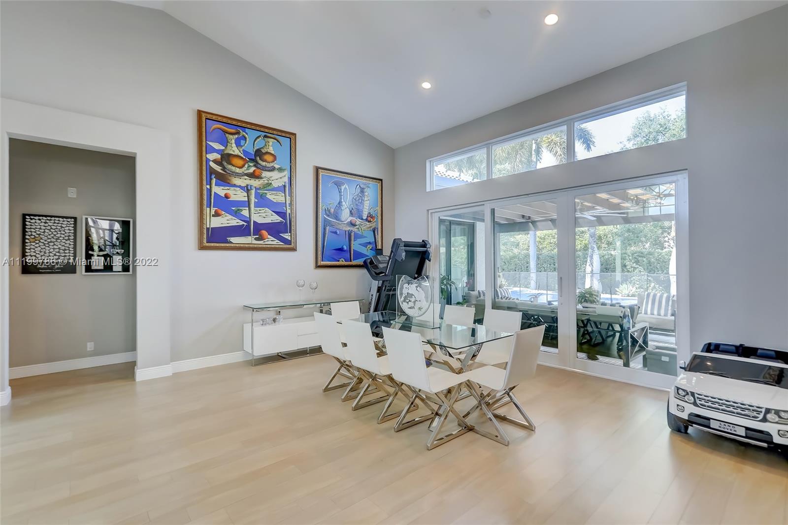9901 North Abiaca Circle Davie, FL 33328 - Photo 4 of 46 a living room with furniture and a large window