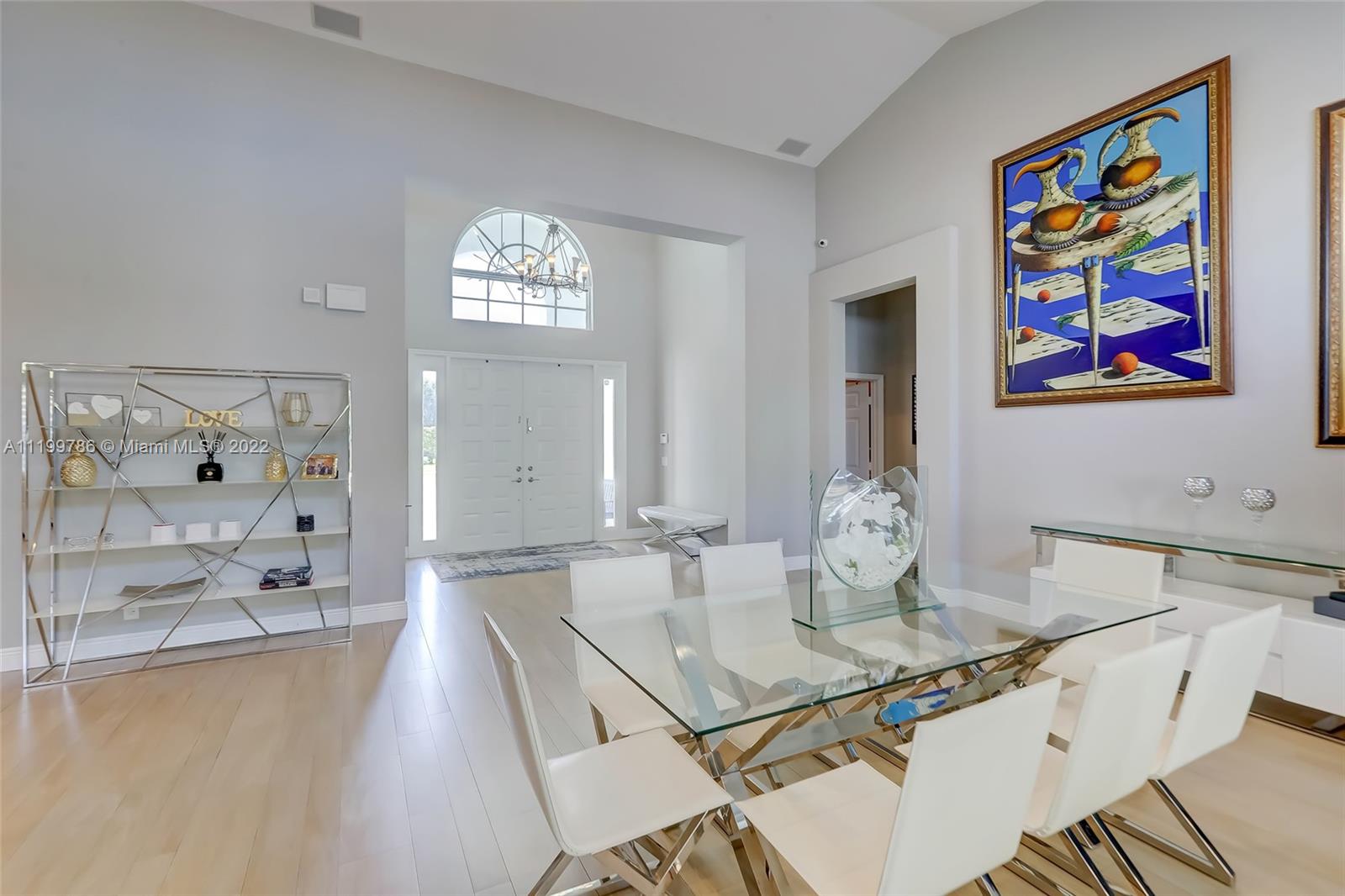 9901 North Abiaca Circle Davie, FL 33328 - Photo 5 of 46 a spacious bathroom with a sink a large mirror and a shower