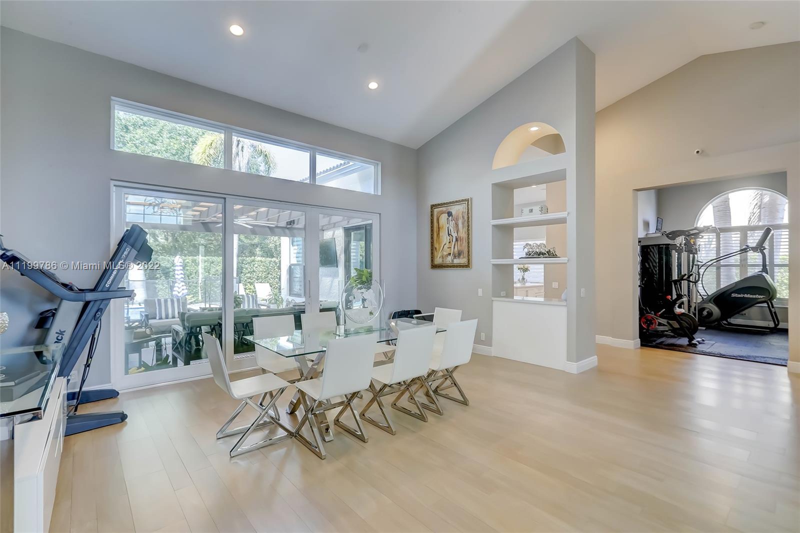 9901 North Abiaca Circle Davie, FL 33328 - Photo 7 of 46 a living room with furniture and a large window