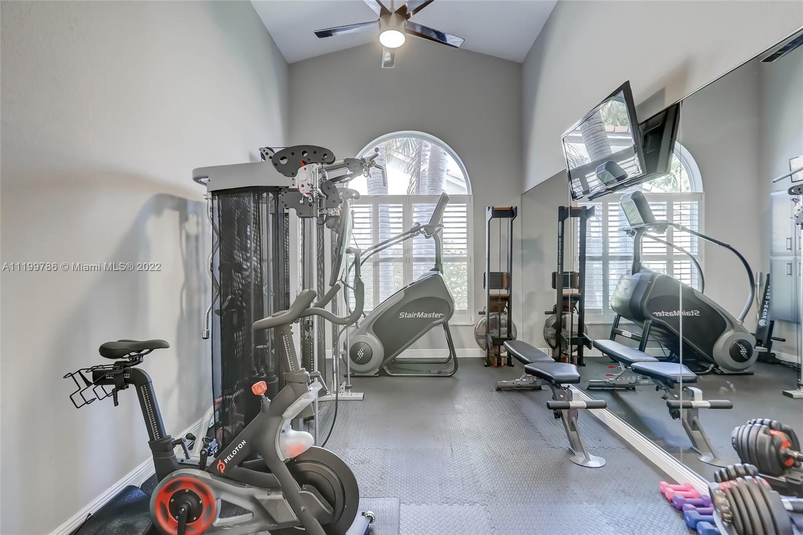 9901 North Abiaca Circle Davie, FL 33328 - Photo 8 of 46 a view of a room with gym equipment